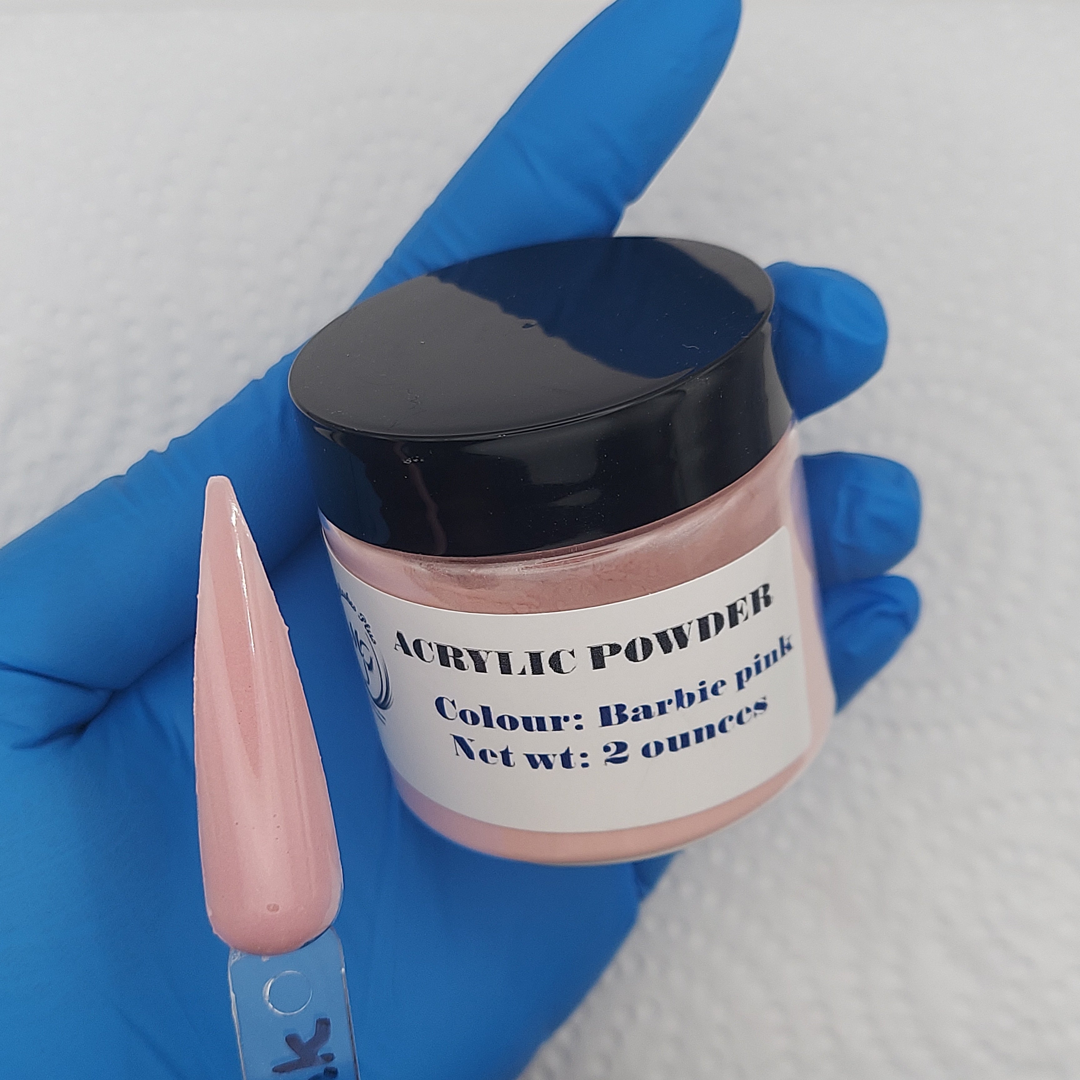 Barbie pink acrylic powder by minklashesplus